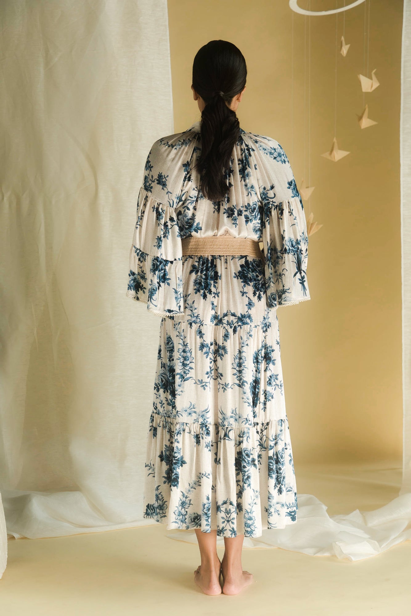Elegant blue bell dress in premium handloom fabric, showcasing a graceful silhouette and artisan craftsmanship, epitomizing luxury womenswear