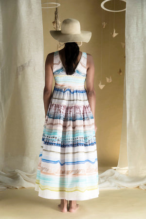 Side view of the Moana Long Dress in luxurious handloom fabric, showcasing its elegant silhouette and exquisite artisan craftsmanship