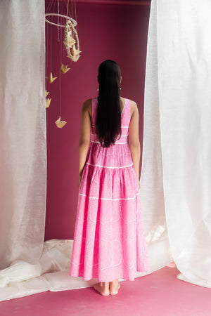 Close-up of Flora Pink Dress showcasing premium handloom fabric and exquisite artisan craftsmanship, epitomizing luxury womenswear