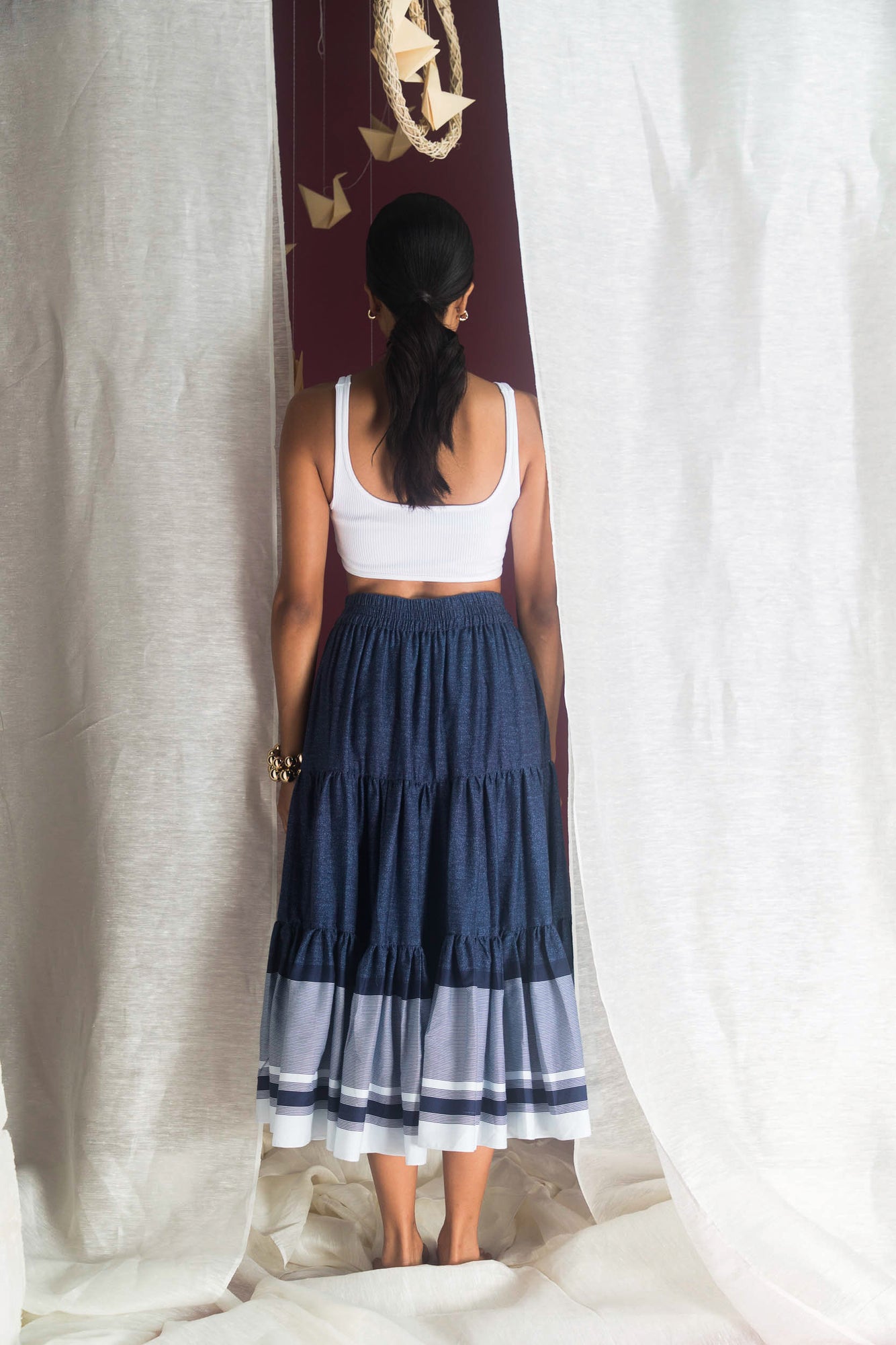 Elegant handloom silk skirt in soft pastel hues, showcasing NJ3 Atelier's luxury craftsmanship and refined silhouette for modern women