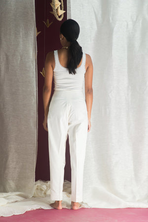 Handcrafted luxury womenswear trousers in premium handloom fabric, showcasing a refined silhouette and exquisite artisan craftsmanship