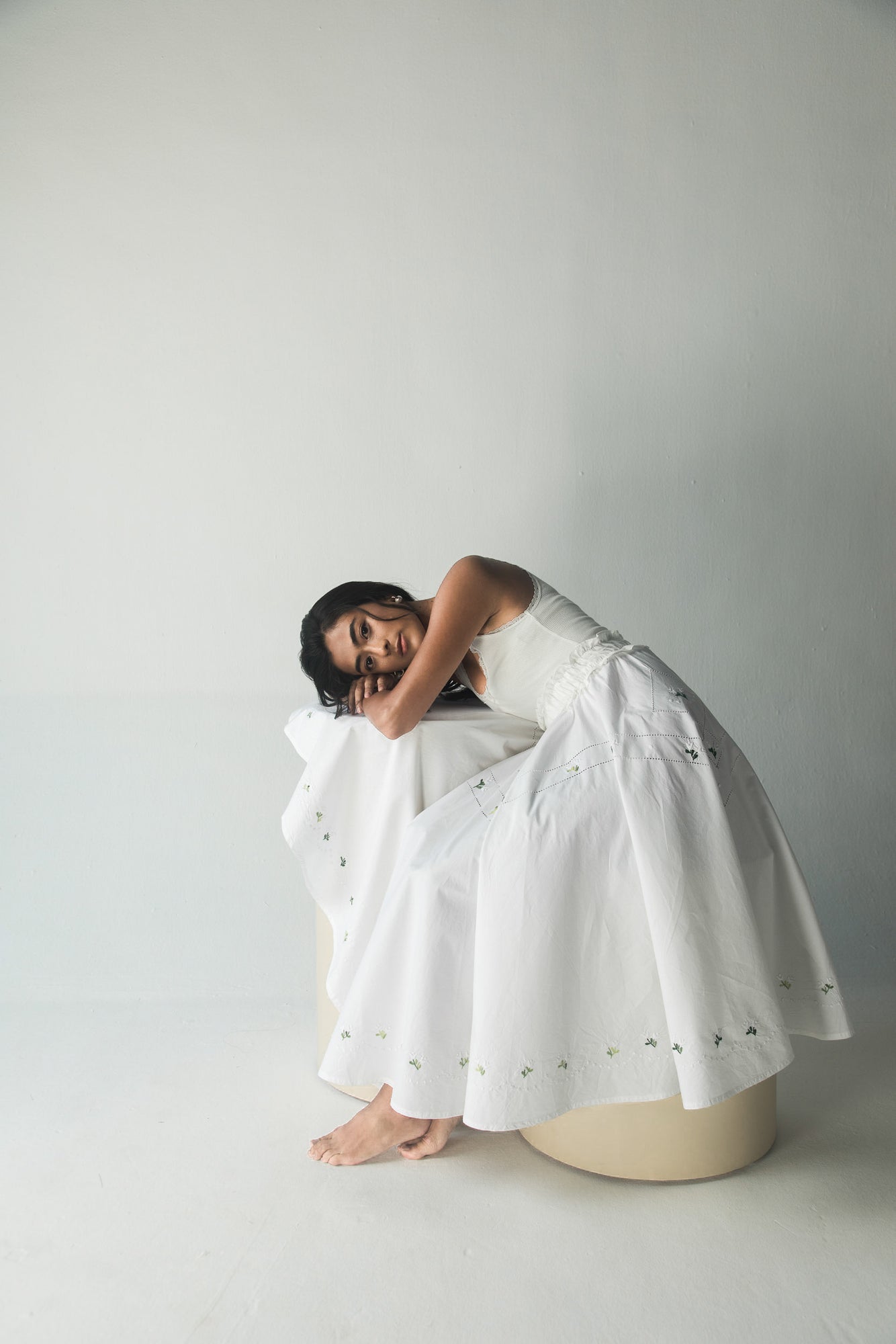Elegant handcrafted paper short skirt in premium fabric, showcasing a luxurious silhouette with artisan detailing, perfect for sophisticated womenswear