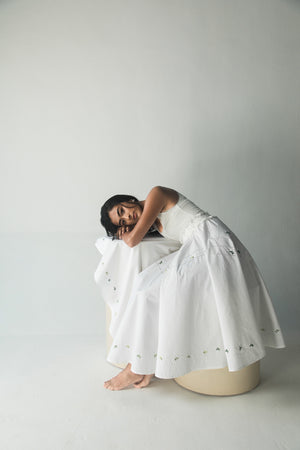 Elegant handcrafted paper short skirt in premium fabric, showcasing a luxurious silhouette with artisan detailing, perfect for sophisticated womenswear