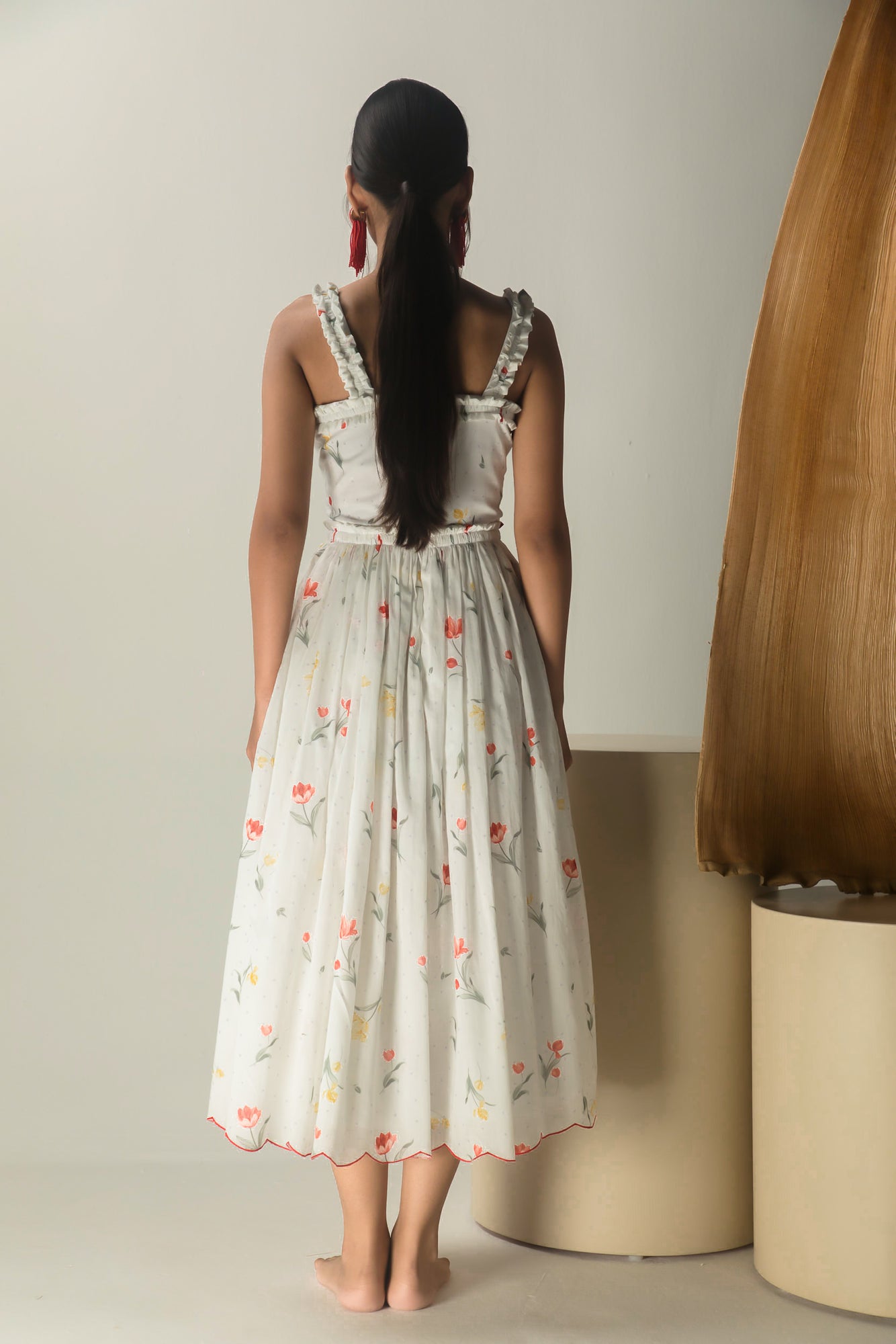 Close-up of the Gaurdenia Midi Dress showcasing its luxurious handloom fabric and artisan-crafted details, embodying NJ3 Atelier's elegance