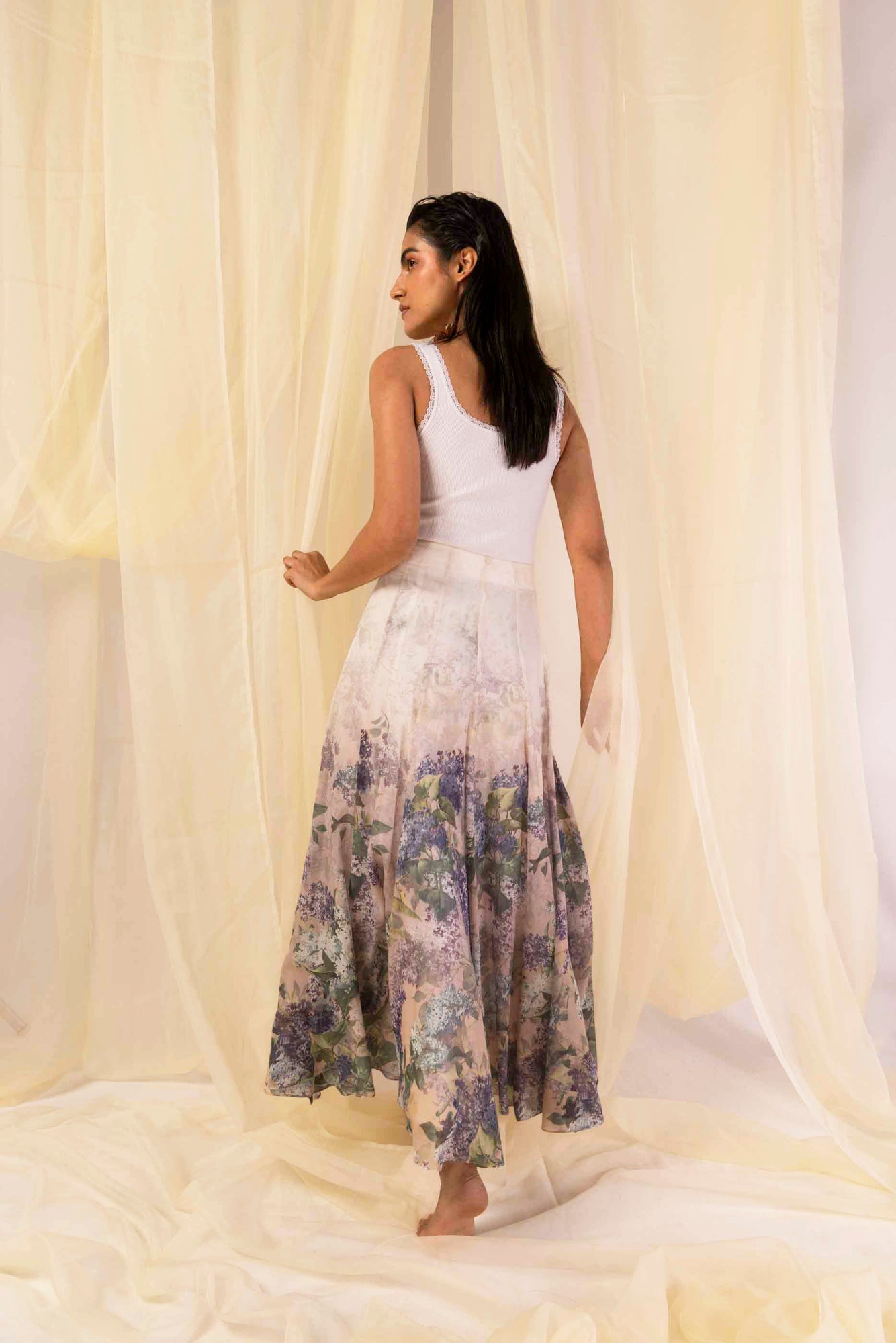 Elegant handloom skirt in vibrant hydra hues, showcasing a flowing silhouette and premium fabric for luxury womenswear