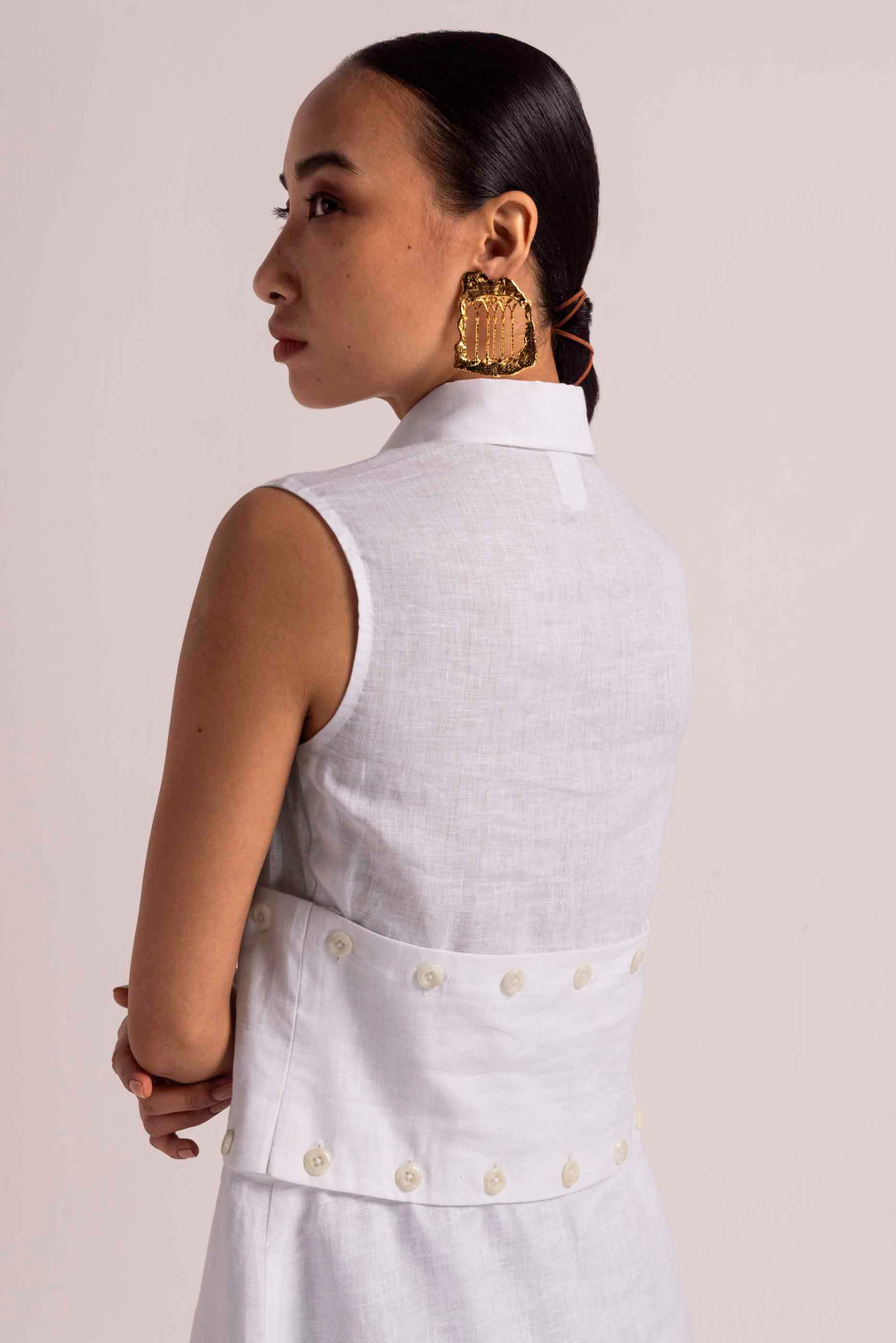Elegant handloom linen dress in a soft blue hue, showcasing a flowing silhouette, crafted with premium fabric for luxury womenswear