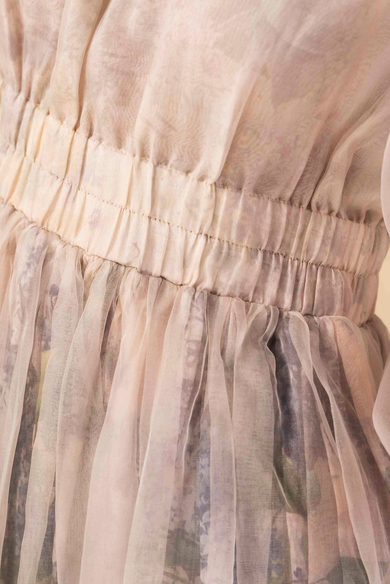 "Close-up of the Hydra Hues Buttery Moss Dress, showcasing the luxurious handloom texture and exquisite artisan craftsmanship."
