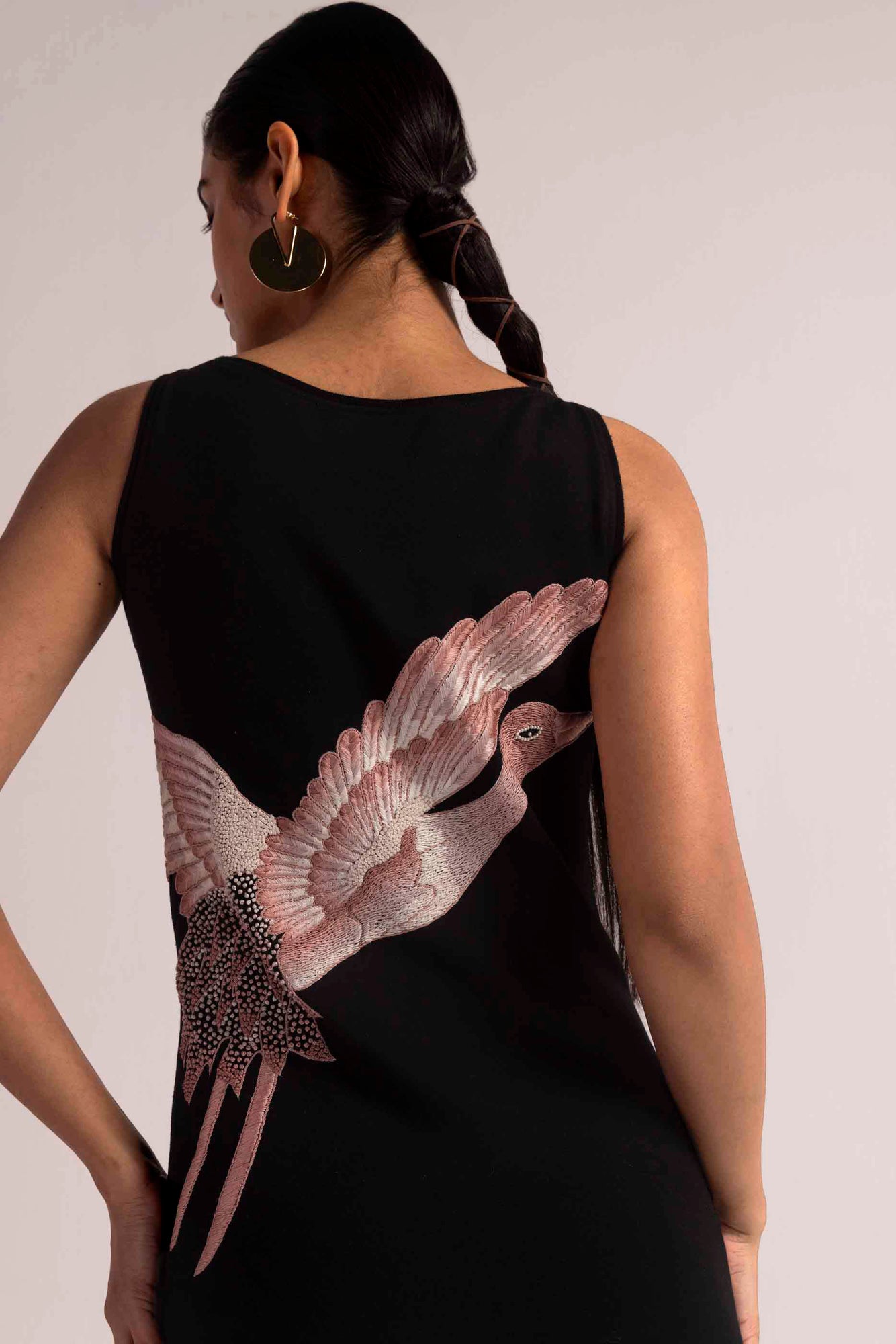 Dark ember dress with intricate hand embroidery, showcasing luxury womenswear in rich hues and premium fabric, artisan-crafted elegance