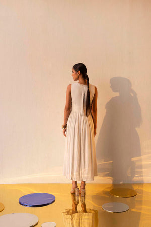 Elegant milky white gauze dress with delicate dot pattern, showcasing NJ3 Atelier's luxury craftsmanship and premium fabric design