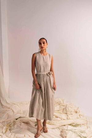Elegant silhouette of the Pearl Perle linen dress in soft ivory, showcasing artisan handloom craftsmanship and luxury womenswear design