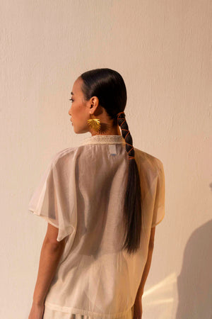 Exquisite lace sheer shirt in premium fabric, showcasing intricate handloom patterns and luxury womenswear elegance by NJ3 Atelier