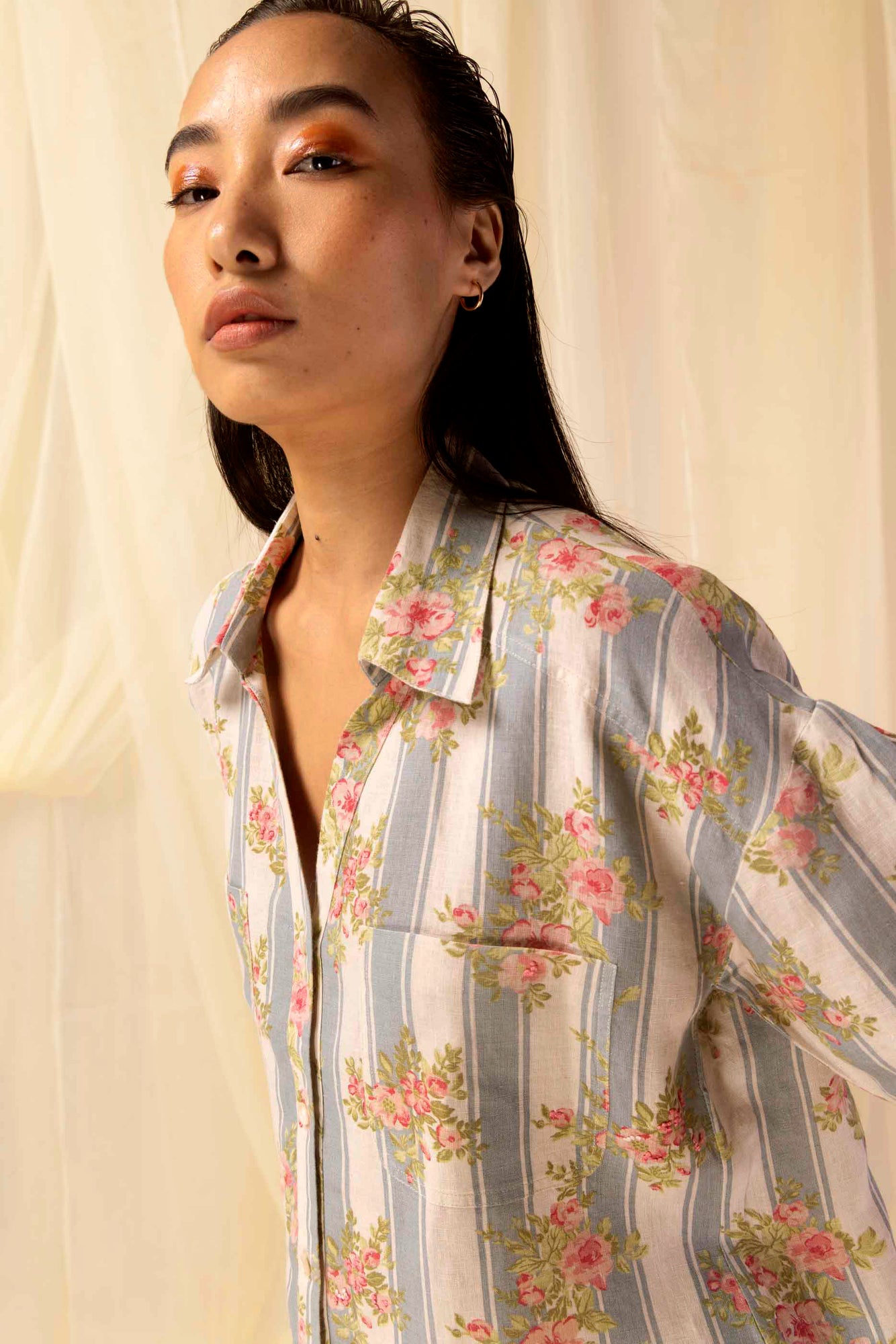 Elegant handloom "fleurline-shirt" in soft pastel hues, showcasing premium fabric and artisan craftsmanship, epitomizing luxury womenswear