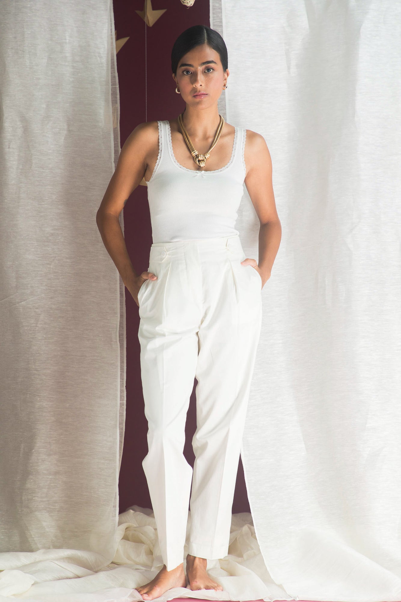 Elegant handloom trousers in rich navy, showcasing NJ3 Atelier's artisan craftsmanship and luxurious fabric for refined womenswear