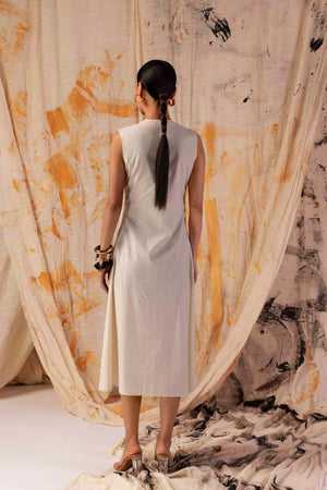 Elegant petal-yellow dress in premium handloom fabric, showcasing exquisite pleats and artisan craftsmanship for luxury womenswear