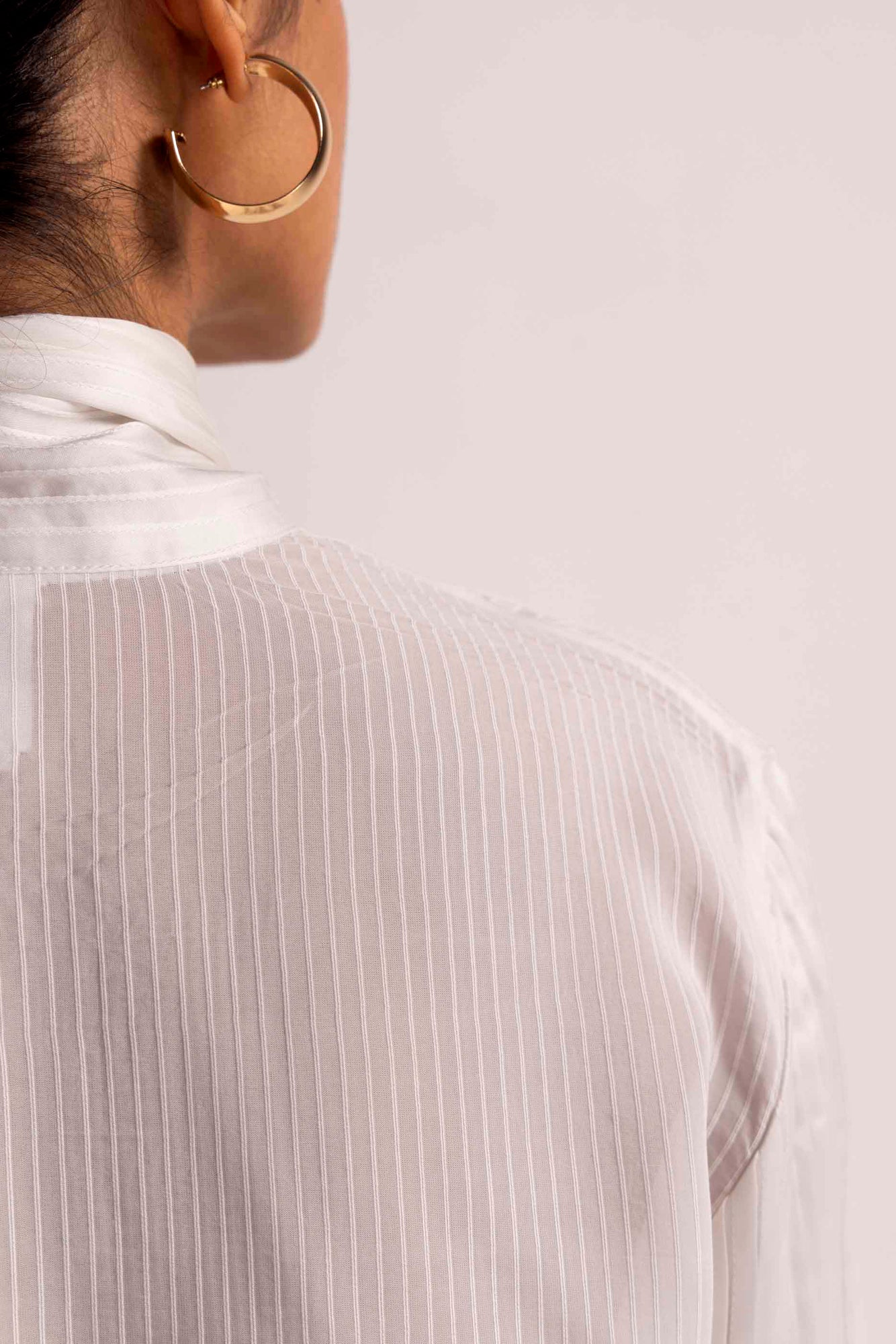 Elegant Valencia Drape Shirt in soft handloom fabric, showcasing a flowing silhouette and exquisite craftsmanship, epitomizing luxury womenswear