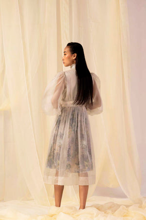 "Close-up of the Hydra Hues Buttery Moss Dress, showcasing its luxurious handloom fabric and exquisite artisan craftsmanship."