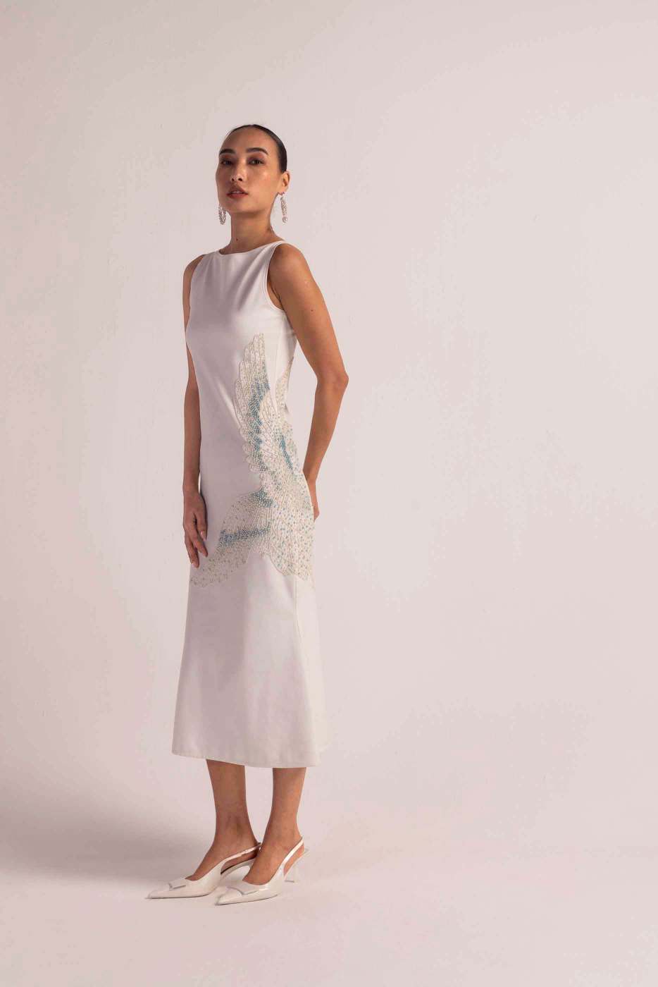Elegant sea-shell pearl dress in premium handloom fabric, showcasing a refined silhouette and artisan craftsmanship, luxury womenswear