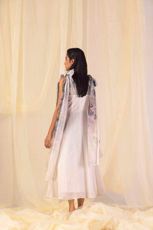 Valencia Stripe Hydra Hues Dress in vibrant handloom fabric, showcasing a luxurious flared silhouette and artisan craftsmanship