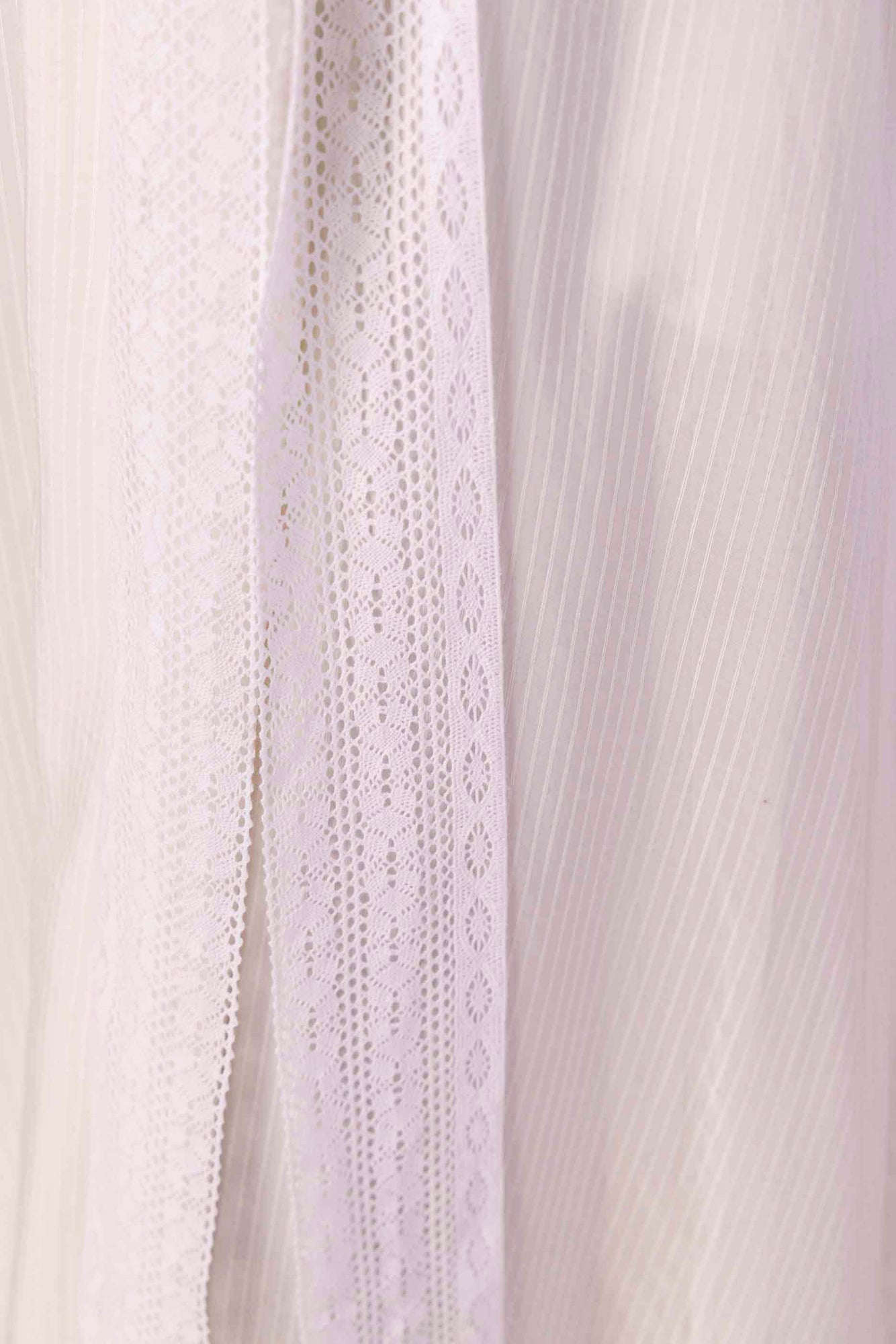 Elegant Valencia Stripe Lacy Dress in premium handloom fabric, showcasing artisan-crafted stripes and a sophisticated silhouette