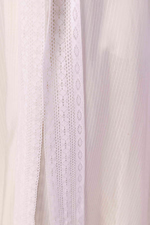 Elegant Valencia Stripe Lacy Dress in premium handloom fabric, showcasing artisan-crafted stripes and a sophisticated silhouette