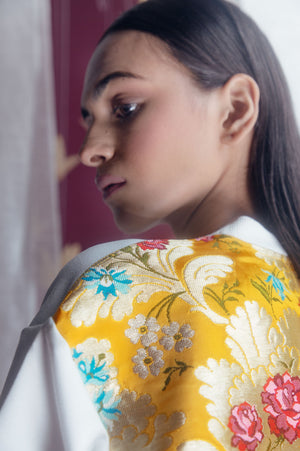 Elegant yellow t-shirt in premium handloom fabric, showcasing NJ3 Atelier's artisan craftsmanship and luxury womenswear style