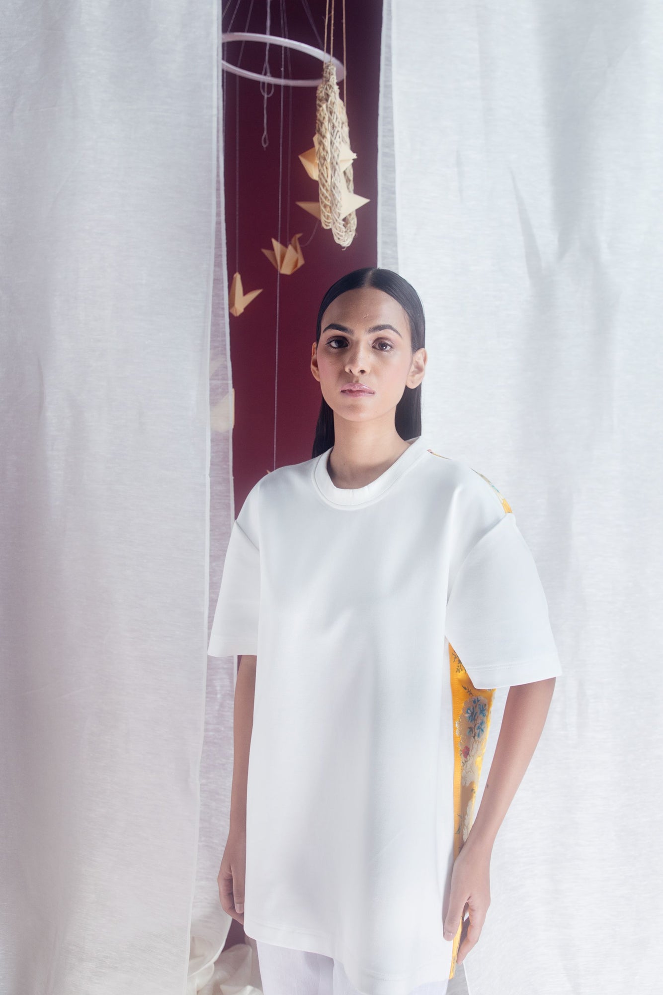 Elegant yellow t-shirt in premium handloom fabric, showcasing NJ3 Atelier's luxury womenswear craftsmanship and artisanal design