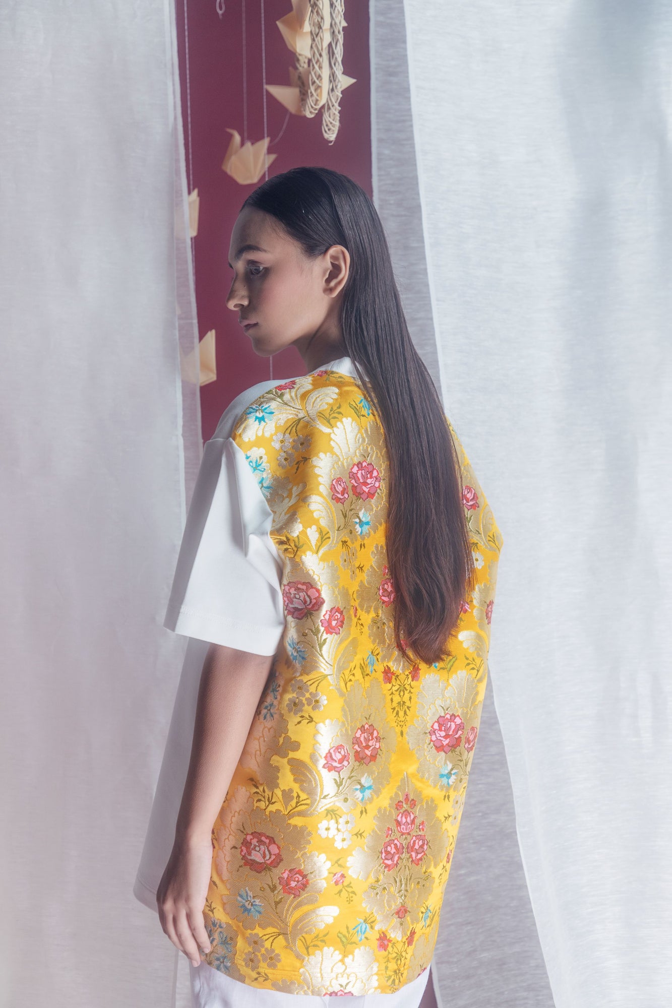 Luxurious loose-fit T-shirt in yellow Tibetan Silk Jacquard, featuring artisan craftsmanship and premium quality, ideal for sophisticated style