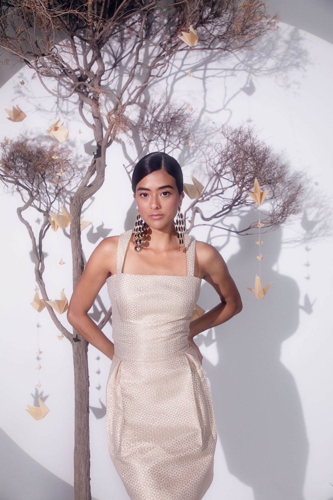 Rose gold slip dress in golden silk jacquard with cotton lurex, showcasing a luxurious, handcrafted silhouette, perfect for elegant occasions