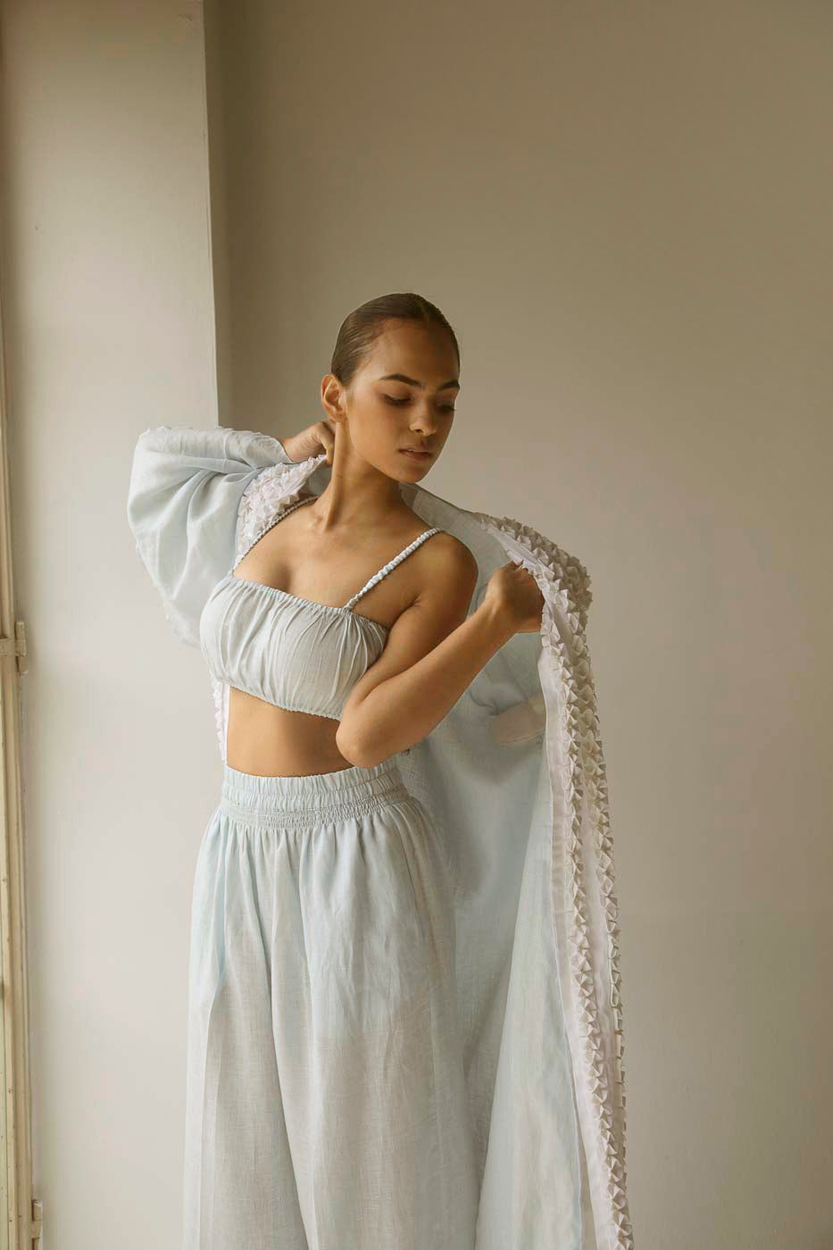 Elegant Roza Tube Top in rich, handloom fabric showcasing a strapless silhouette; a testament to luxury womenswear craftsmanship