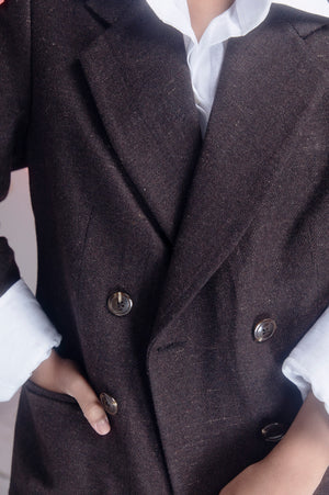 Luxurious brown blazer in premium handloom fabric, showcasing elegant silhouette and artisan craftsmanship, perfect for sophisticated womenswear