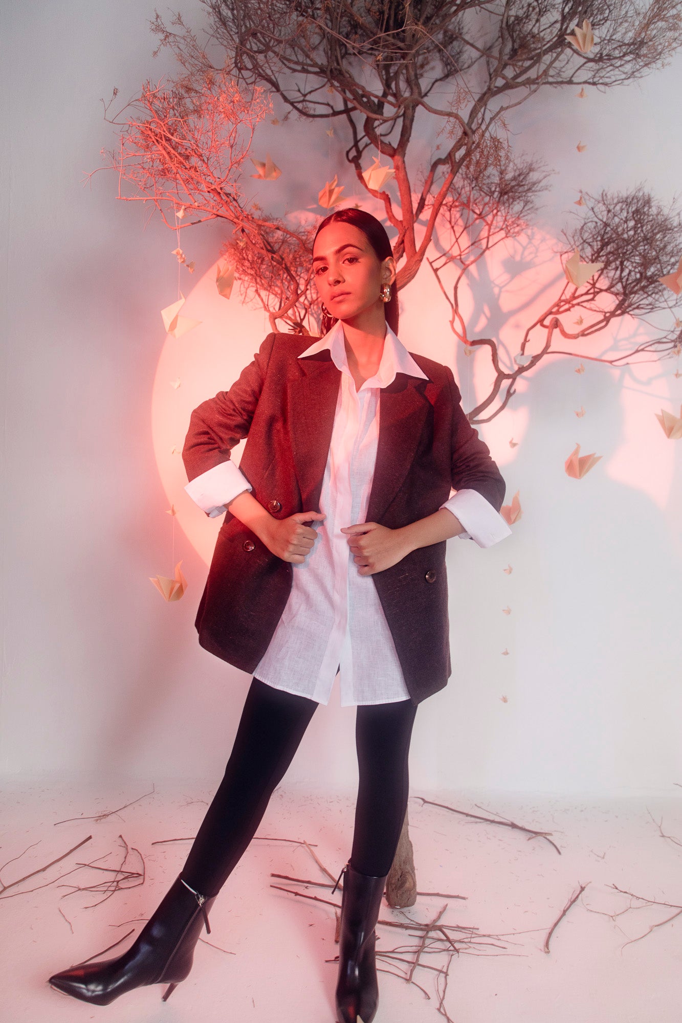 Luxurious brown blazer in premium handloom fabric, showcasing a tailored silhouette and exquisite artisan craftsmanship