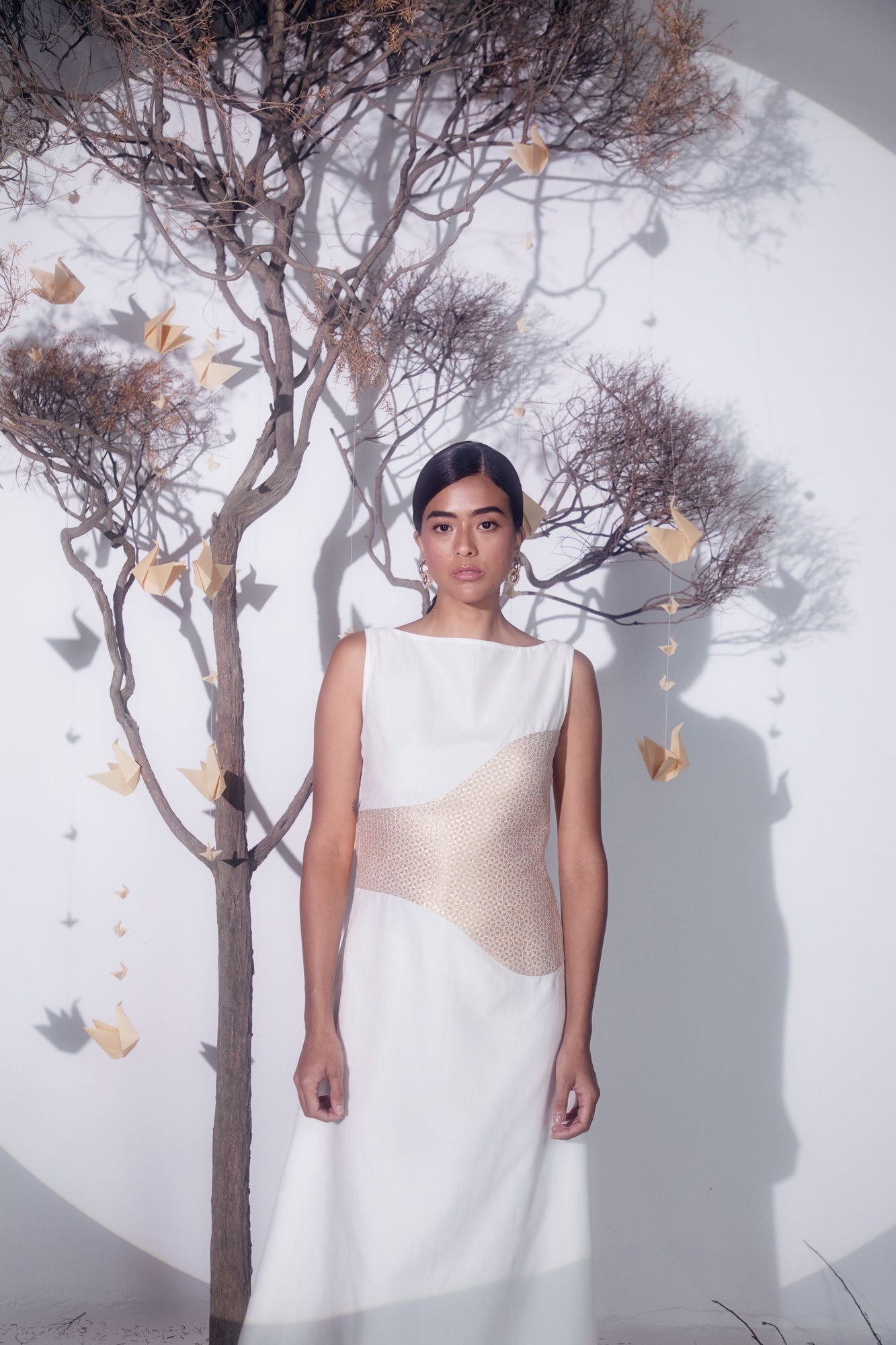 Elegant shift midi dress in butter white and rose gold, crafted from luxurious jacquard and chanderi silk, featuring a sophisticated pattern