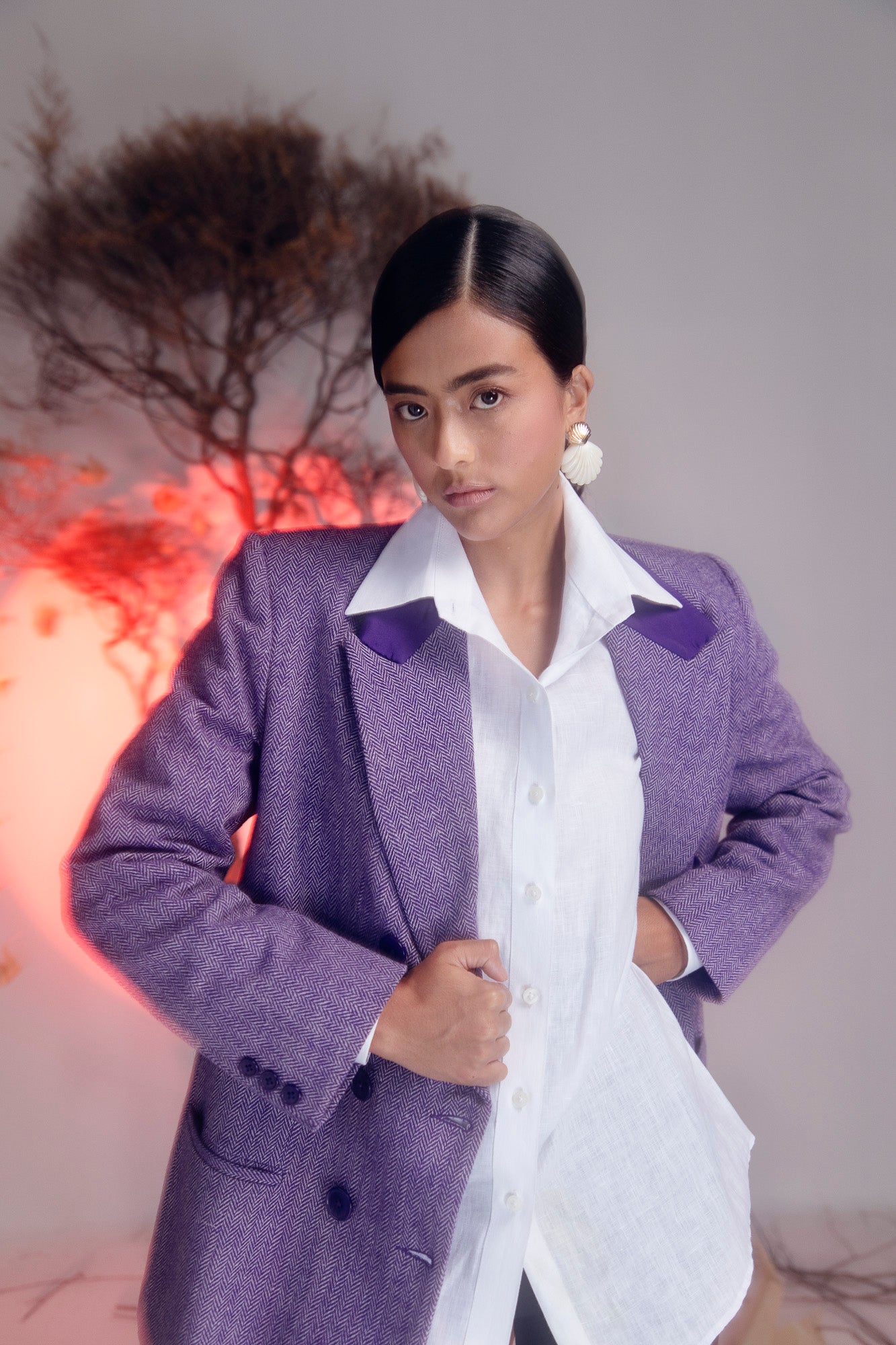 Luxurious Charoite purple blazer in pure woolen herringbone with silk collar, showcasing artisan craftsmanship and premium fabric elegance