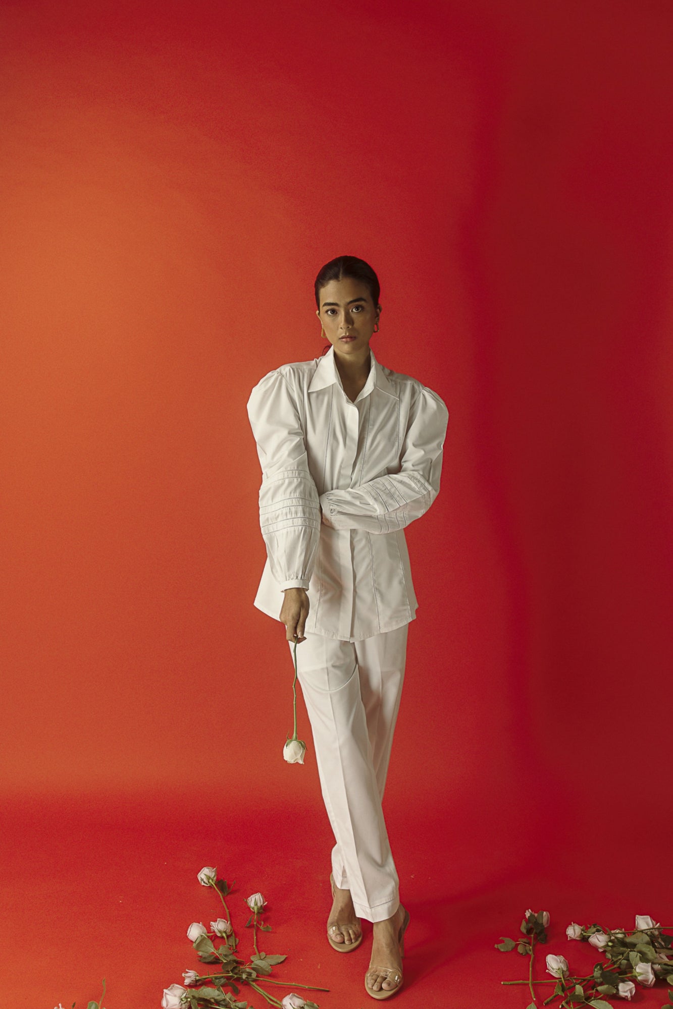 White pure cotton lace pants, showcasing a luxurious, handcrafted design with a relaxed silhouette, ideal for sophisticated styling