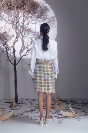 Elegant clay pencil skirt in premium handloom fabric, showcasing a sleek silhouette and refined craftsmanship for luxury womenswear