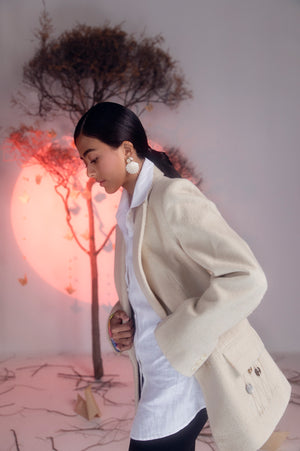 White felt blazer with a multi-color lining, crafted from premium crepe silk, showcasing luxury womenswear and artisan craftsmanship