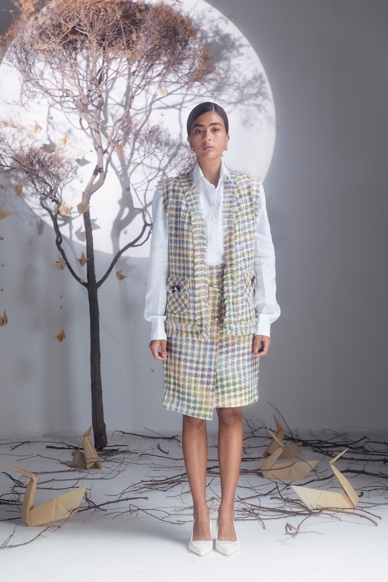 Close-up of handcrafted Luse Clay Jacket in premium fabric, showcasing artisan detail and luxury womenswear elegance