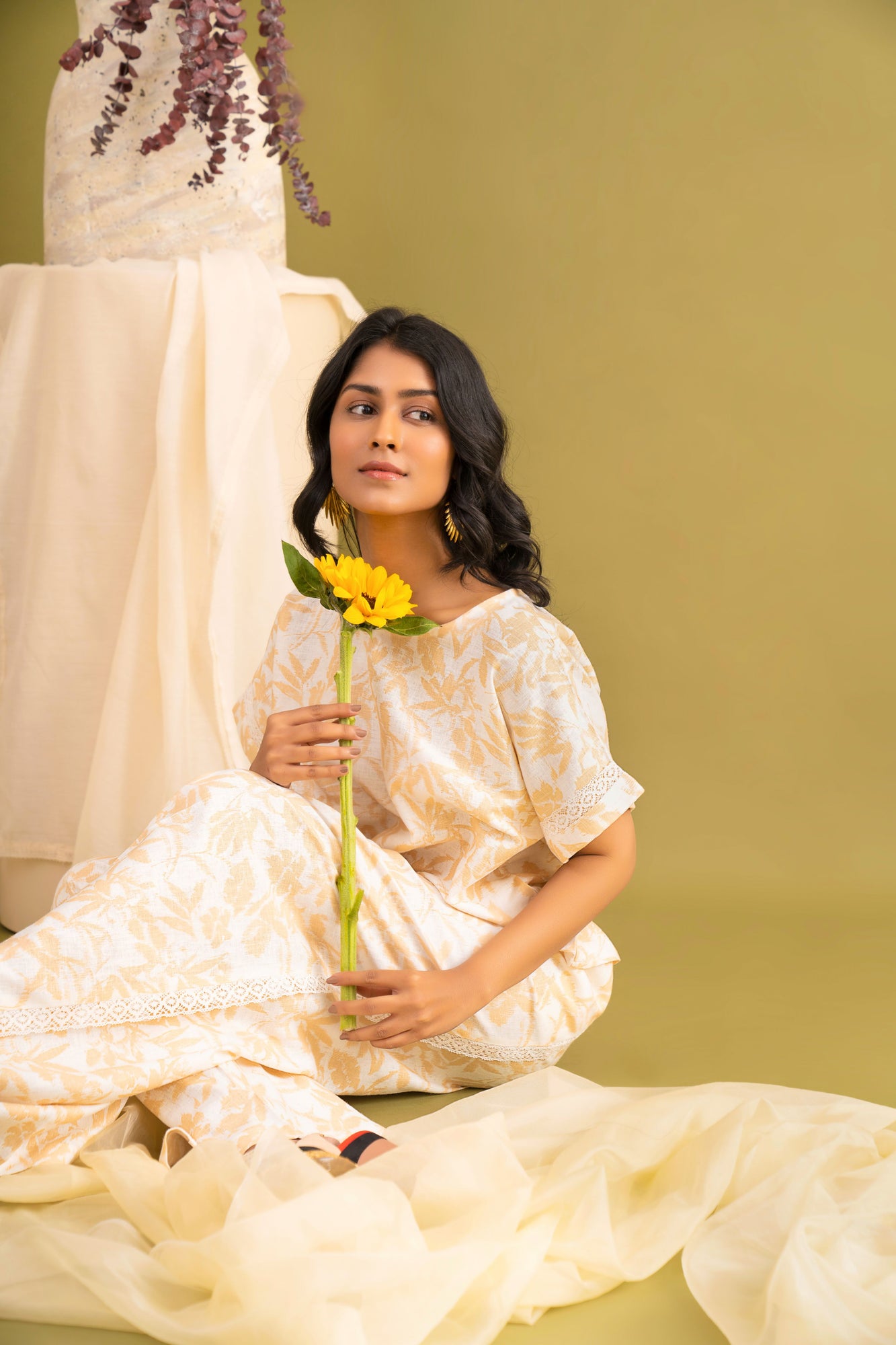 Elegant pumpkin-hued dolman top with artisan-crafted details, showcasing premium handloom fabric and sophisticated silhouette