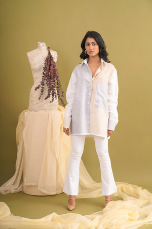 Luxurious linen shirt in white, beige, or blue with a taffeta placket, showcasing premium craftsmanship and elegant design
