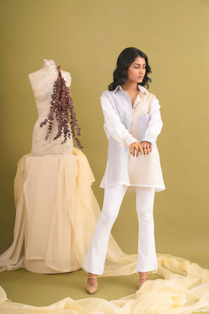Elegant mix-match shirt in premium handloom fabric, showcasing a unique patchwork design with vibrant hues, epitomizing luxury womenswear