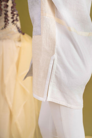 Artisan-crafted shirt in vibrant hues, showcasing premium handloom fabric and elegant silhouette, epitomizing luxury womenswear