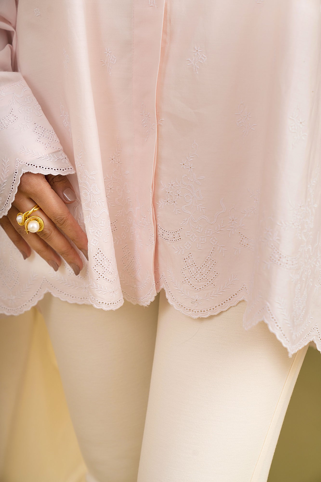 Handcrafted pink scallop shirt in premium fabric, showcasing NJ3 Atelier's luxury womenswear with artisan-made elegance