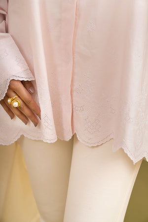Handcrafted pink scallop shirt in premium fabric, showcasing NJ3 Atelier's luxury womenswear with artisan-made elegance