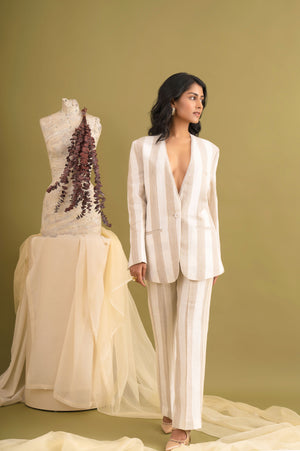 Elegant handcrafted gypsum cord set in premium fabric, showcasing luxury womenswear with a refined silhouette and artisanal detail