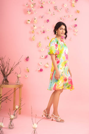Elegant handcrafted short dress in premium fabric, showcasing a vibrant mix of colors and a chic silhouette, epitomizing luxury womenswear