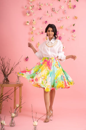Handcrafted circular skirt in vibrant yellow, pink, and green Samo Satin silk, showcasing luxury womenswear with a flared silhouette