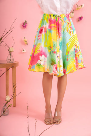 Handcrafted circular skirt in vibrant hues, showcasing premium handloom fabric with a luxurious flare, epitomizing artisan elegance