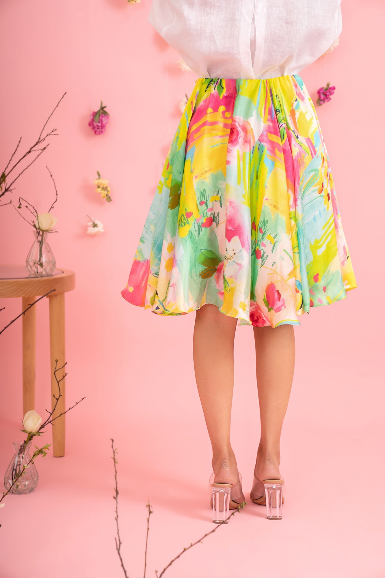 Handcrafted circular skirt in vibrant hues, showcasing premium handloom fabric and a flared silhouette, epitomizing luxury womenswear