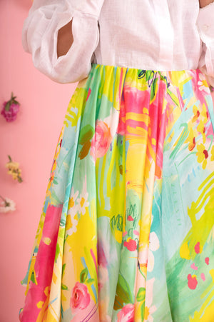 Handcrafted circular skirt in vibrant hues, showcasing premium handloom fabric and a graceful flare, epitomizing luxury womenswear