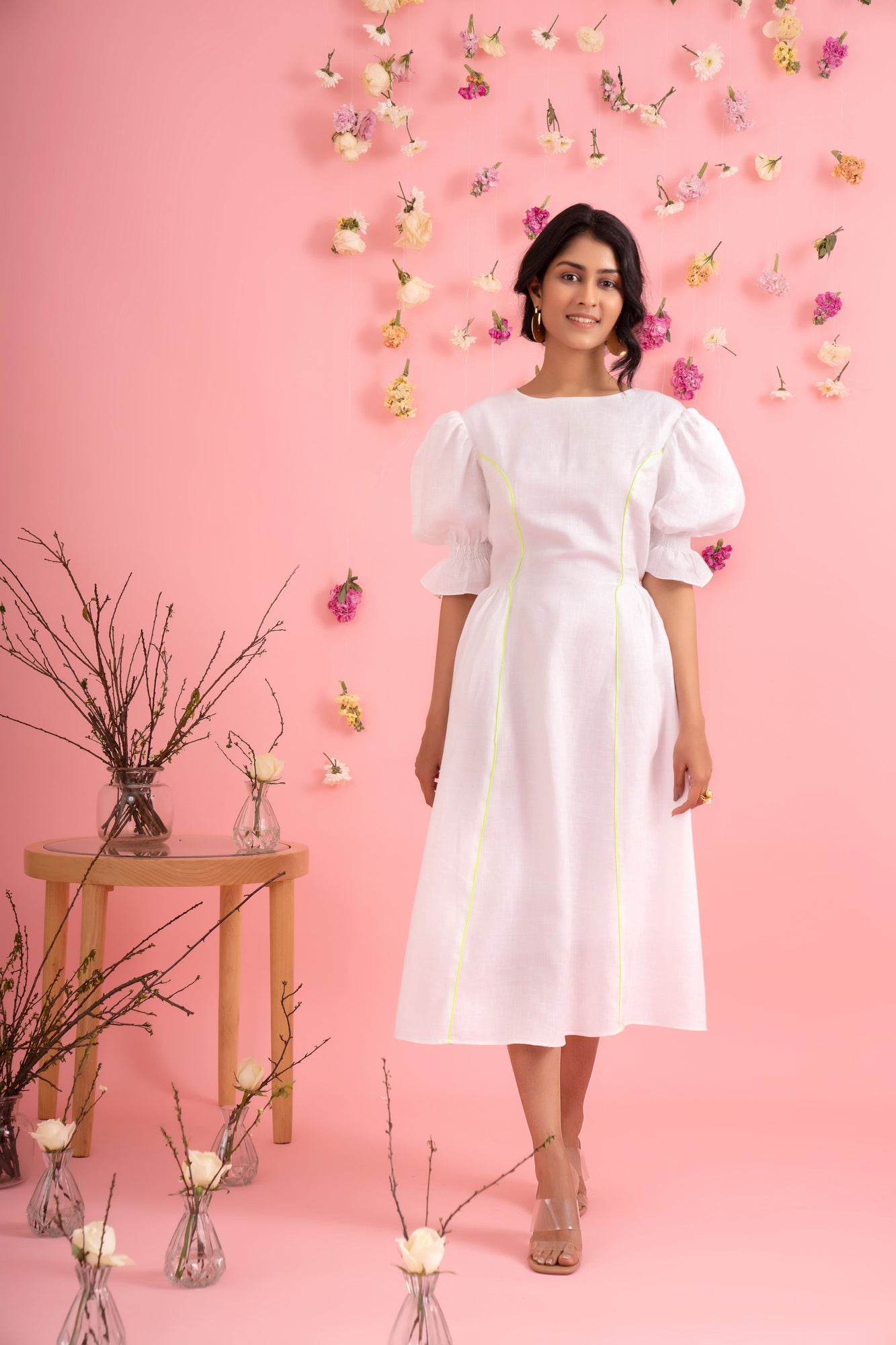 Elegant floral midi dress in premium handloom fabric, showcasing a refined silhouette, perfect for luxury womenswear enthusiasts